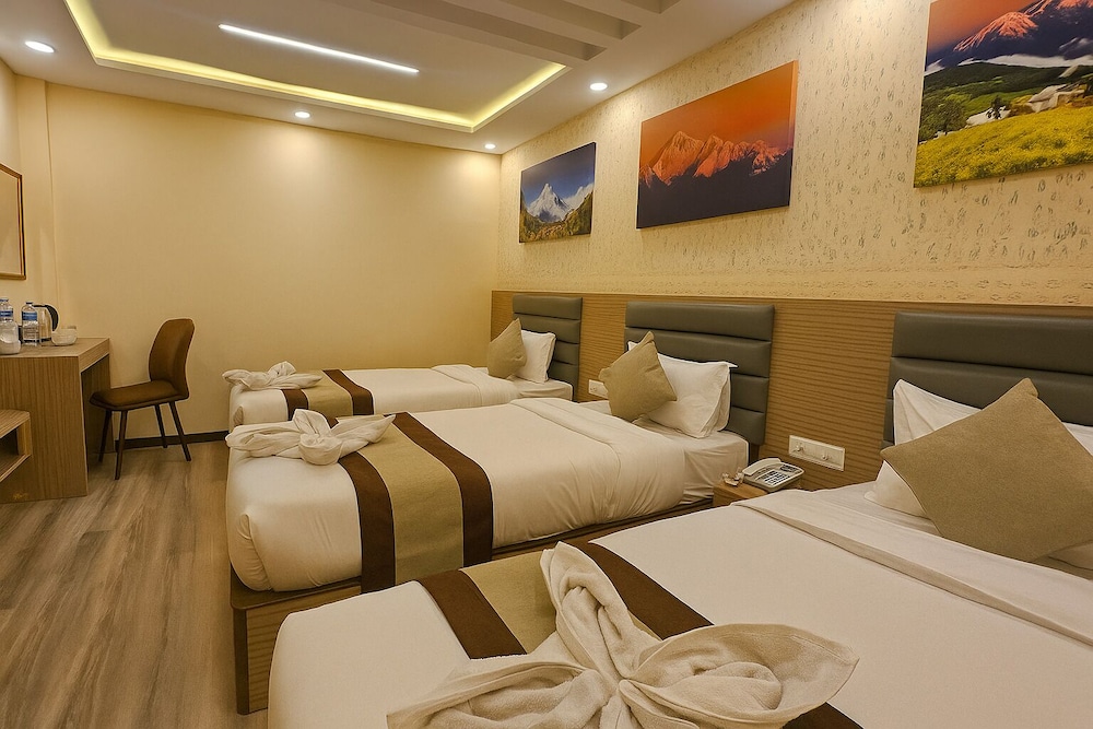 Deluxe Triple Room [10% discount in Rooftop Restaurant with Mountain and City View]
