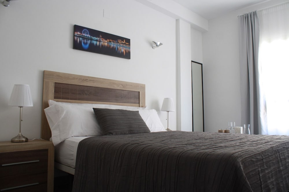 Habitación Deluxe, Baño Privado, Vista a la Ciudad