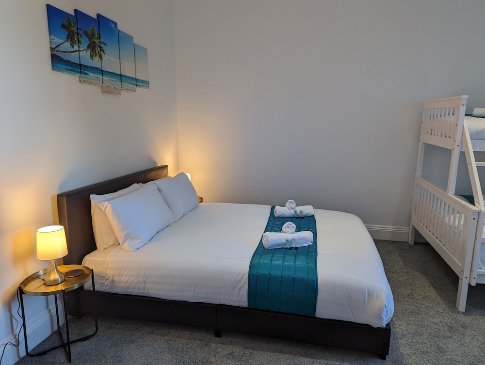 Family Room, Multiple Beds - Photo 9
