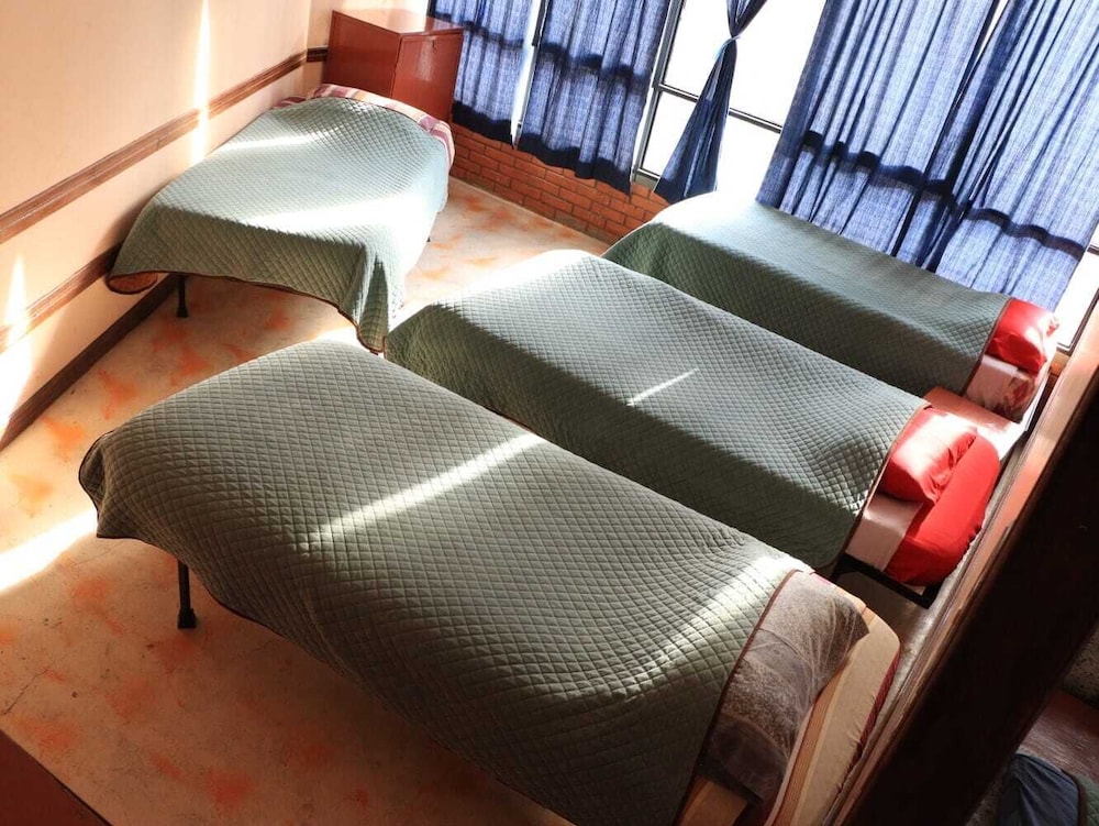 Bed on Mixed Shared Dormitory Quadruple, Private Bathroom photo 1