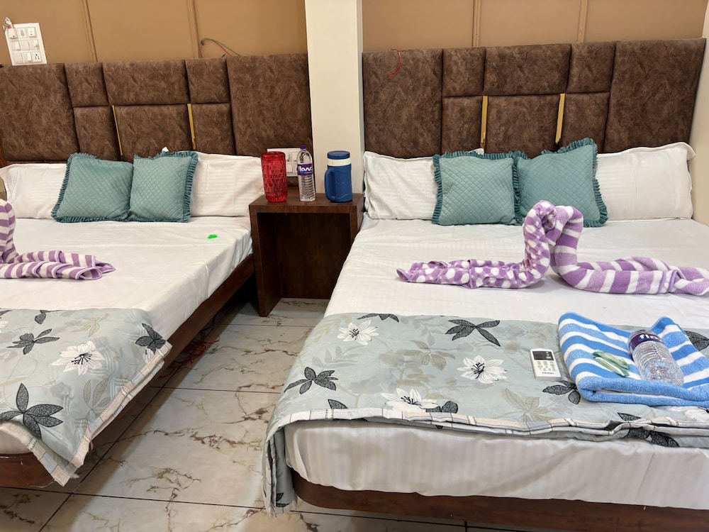 Deluxe Quadruple Room, Balcony, City View