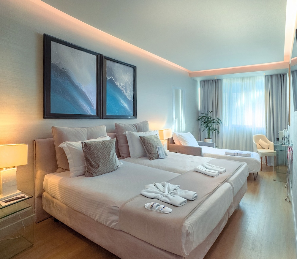 Basic Triple Room with Courtyard View - Photo 1