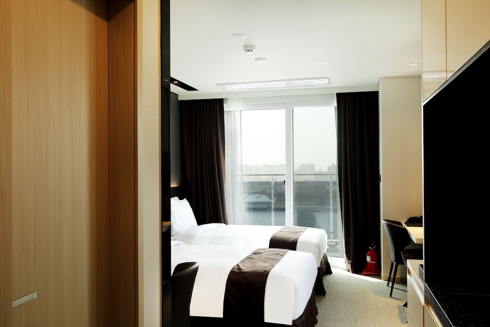 Family Twin Room - Photo 6