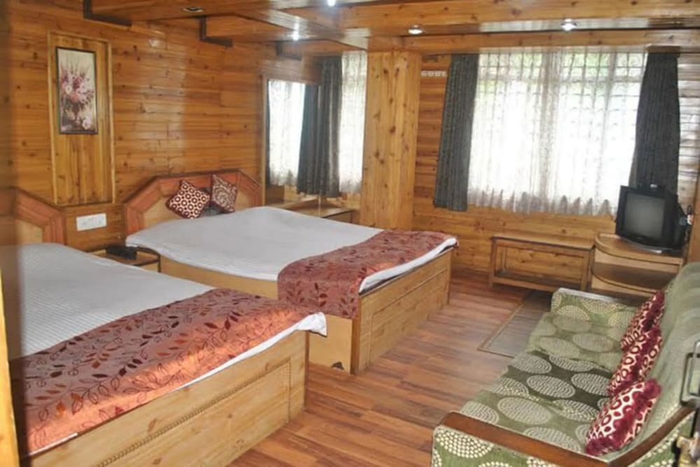 Deluxe Quadruple Room - Photo 10