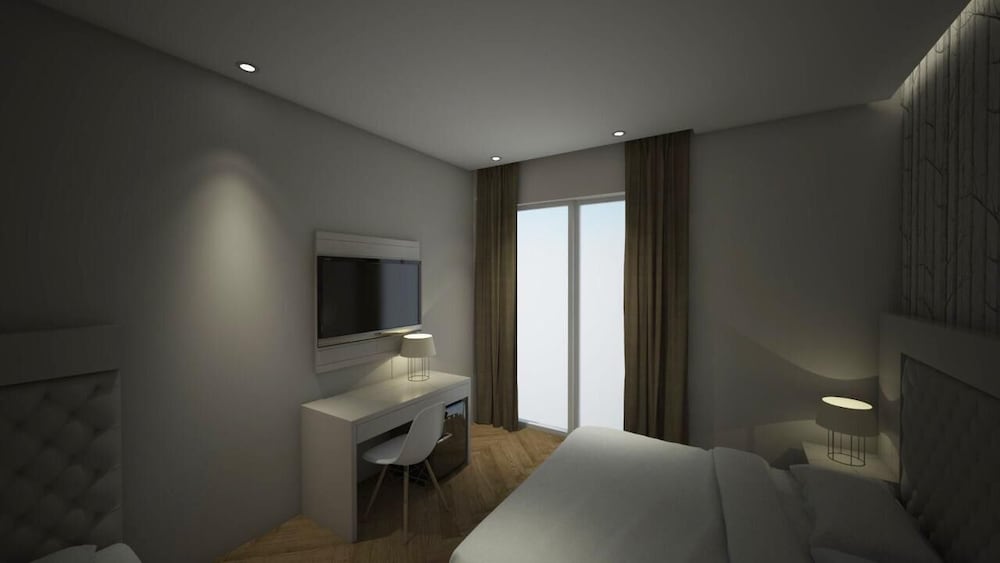 Standard Quadruple Room, Balcony, Partial Sea View photo 2