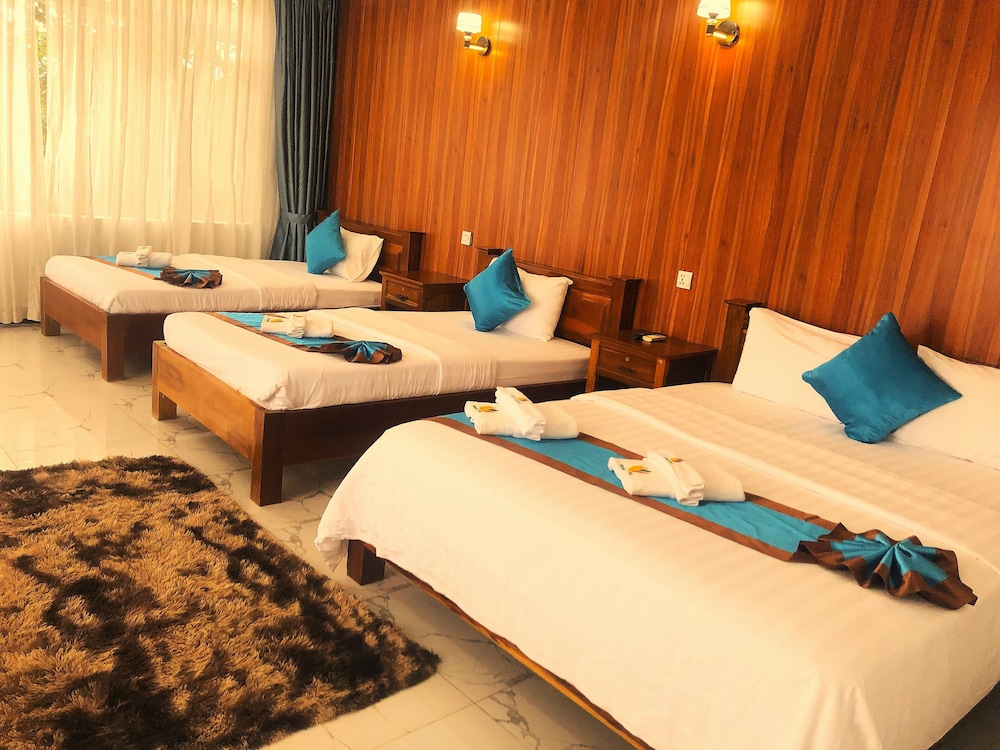 Deluxe Triple Room - Photo 1