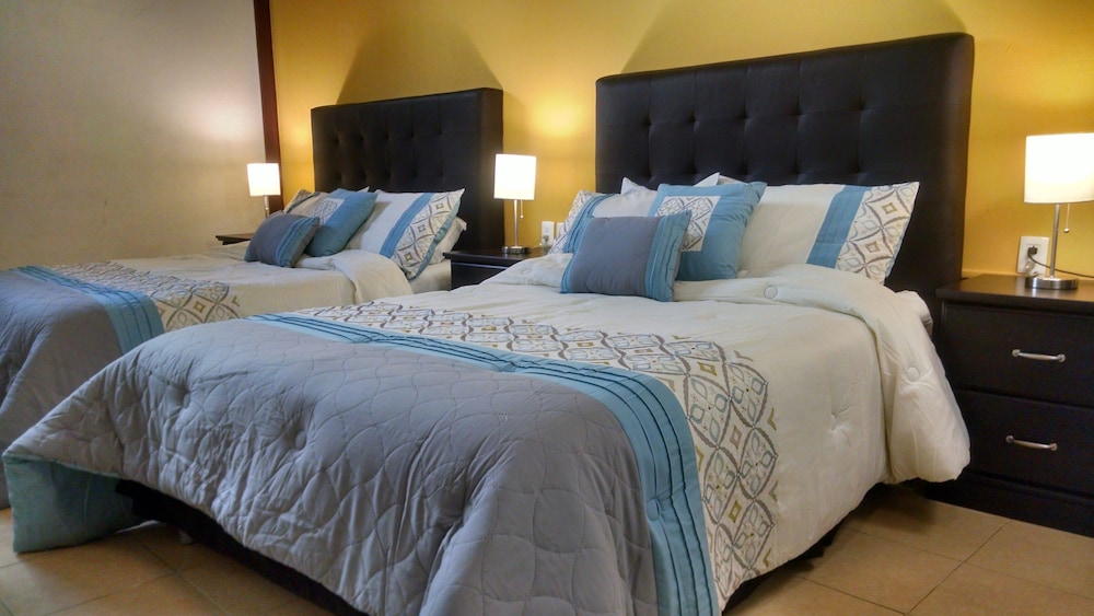 Comfort Quadruple Room, Pool View photo 1