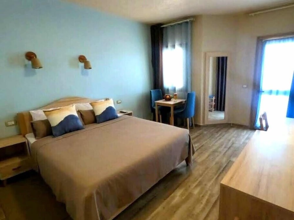 Standard Double Room, Balcony, Garden View