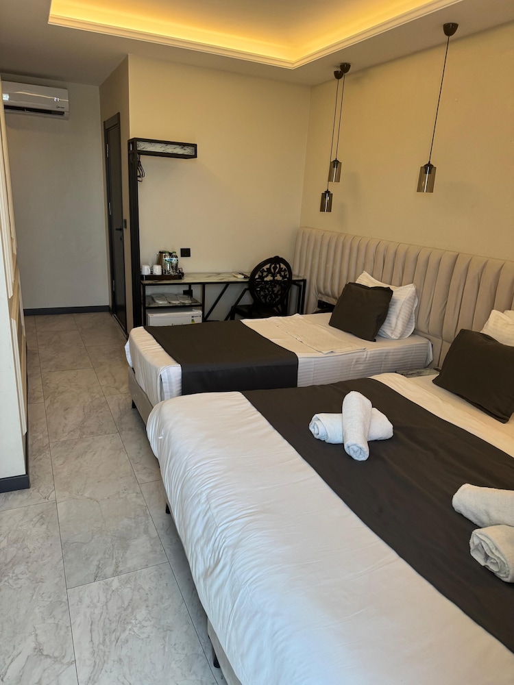 Deluxe Triple Room - Photo 4