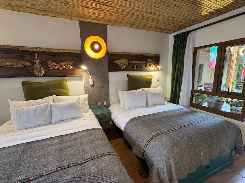 Family Room, Multiple Beds, Kitchenette, Courtyard View photo 2