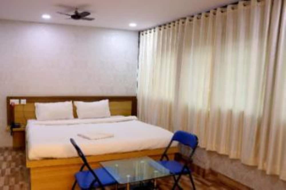 Deluxe Room - Photo 2