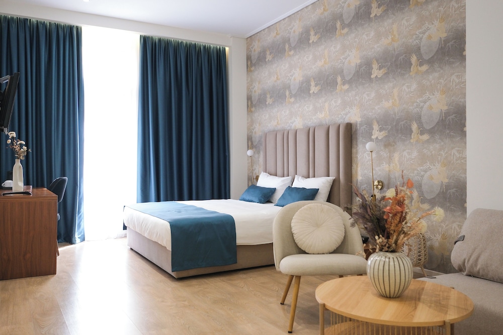 Family Quadruple Room, 1 King Bed with Sofa bed, Non Smoking, City View photo 1
