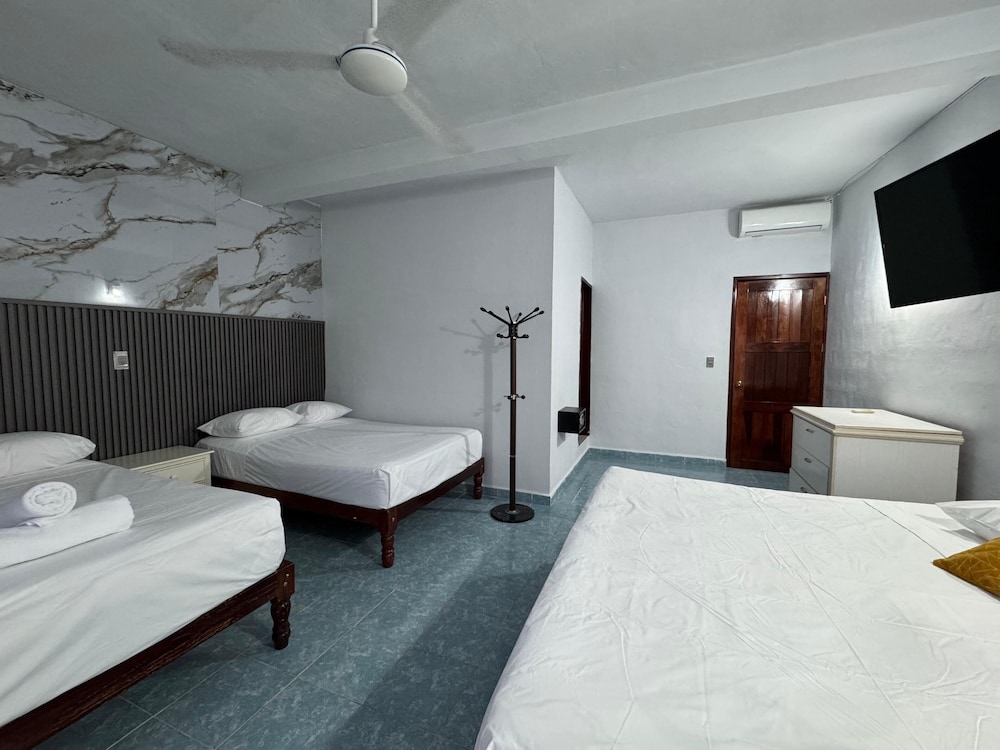 Family Triple Room, Balcony, Garden View