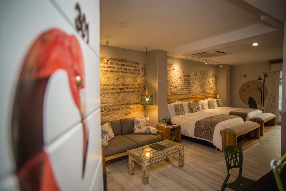Deluxe Quadruple Room, 2 Queen Beds, Balcony, City View photo 2