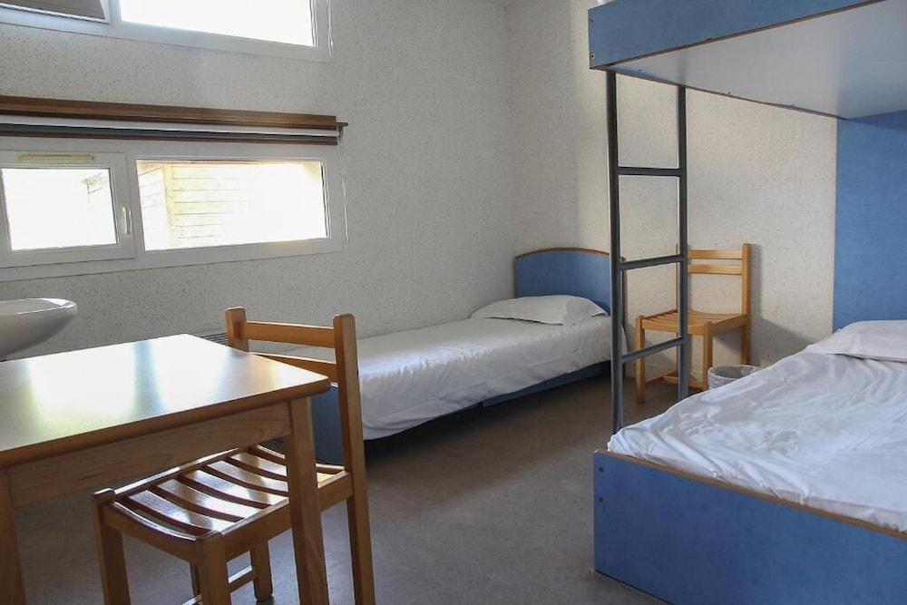 Bed in 3-Bed Male Dormitory - Shared Bathroom photo 1