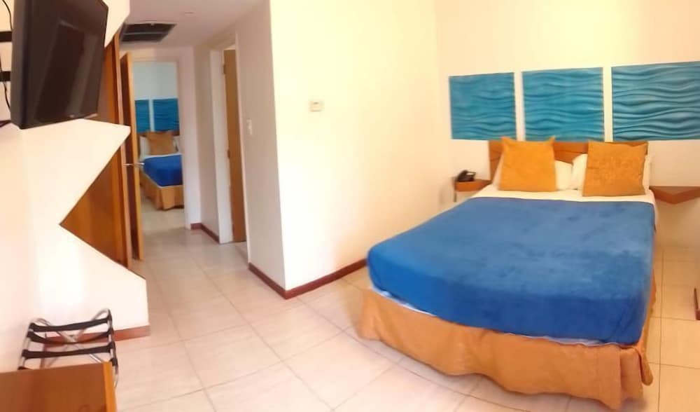 Standard Quadruple Room, City View photo 1