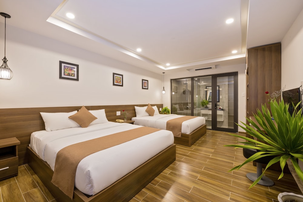 Deluxe Triple Room - Photo 2