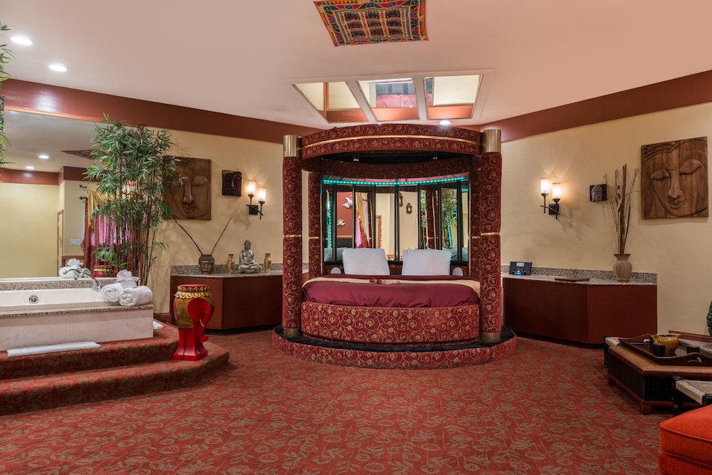 Asian Theme Suite with Round Bed, Jetted Tub & Fireplace - Photo 1