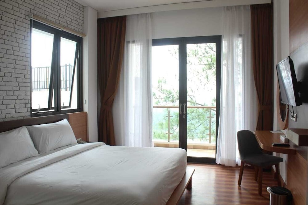 Deluxe Room - Photo 1