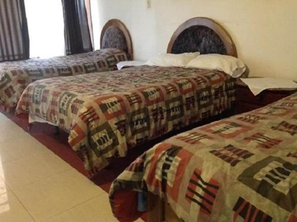 Economy Triple Room photo 1