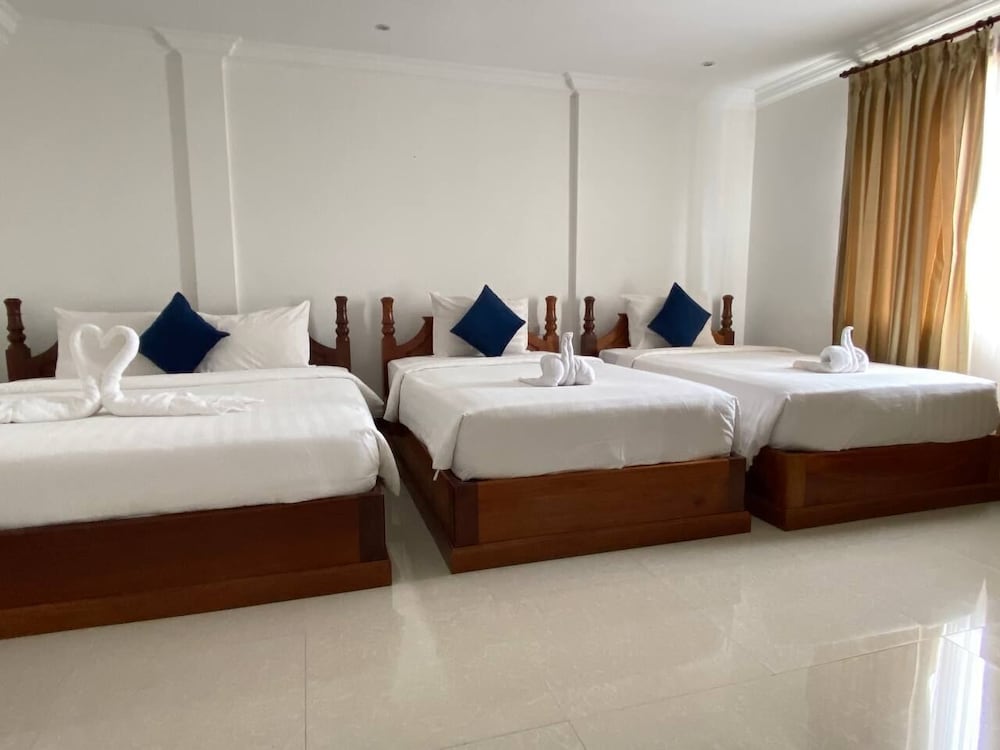 Deluxe Triple Room - Photo 5