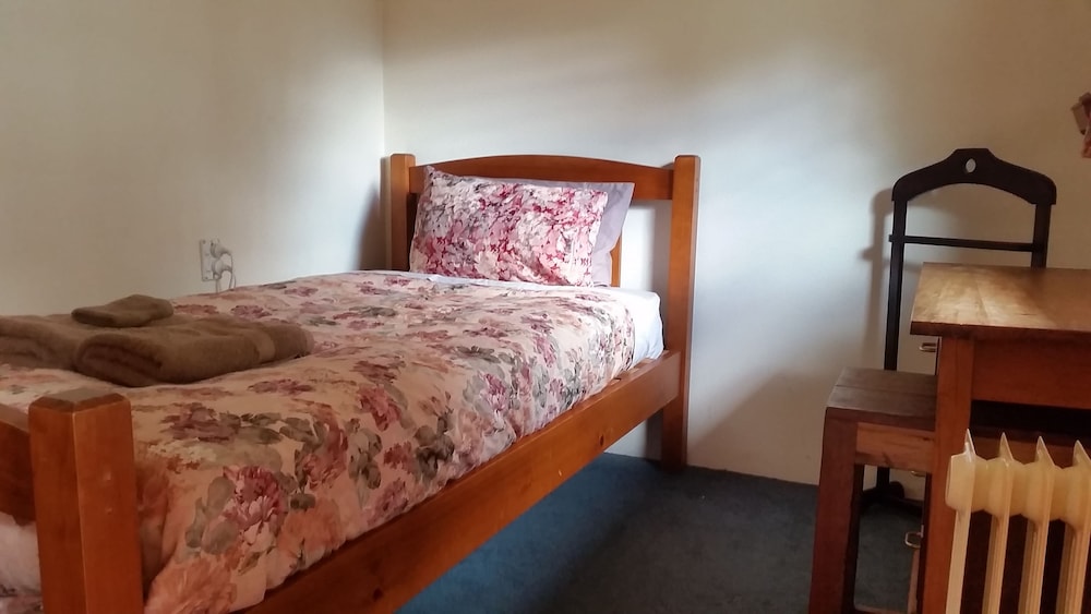 Basic Single Room, 1 Twin Bed, Shared Bathroom, Garden View