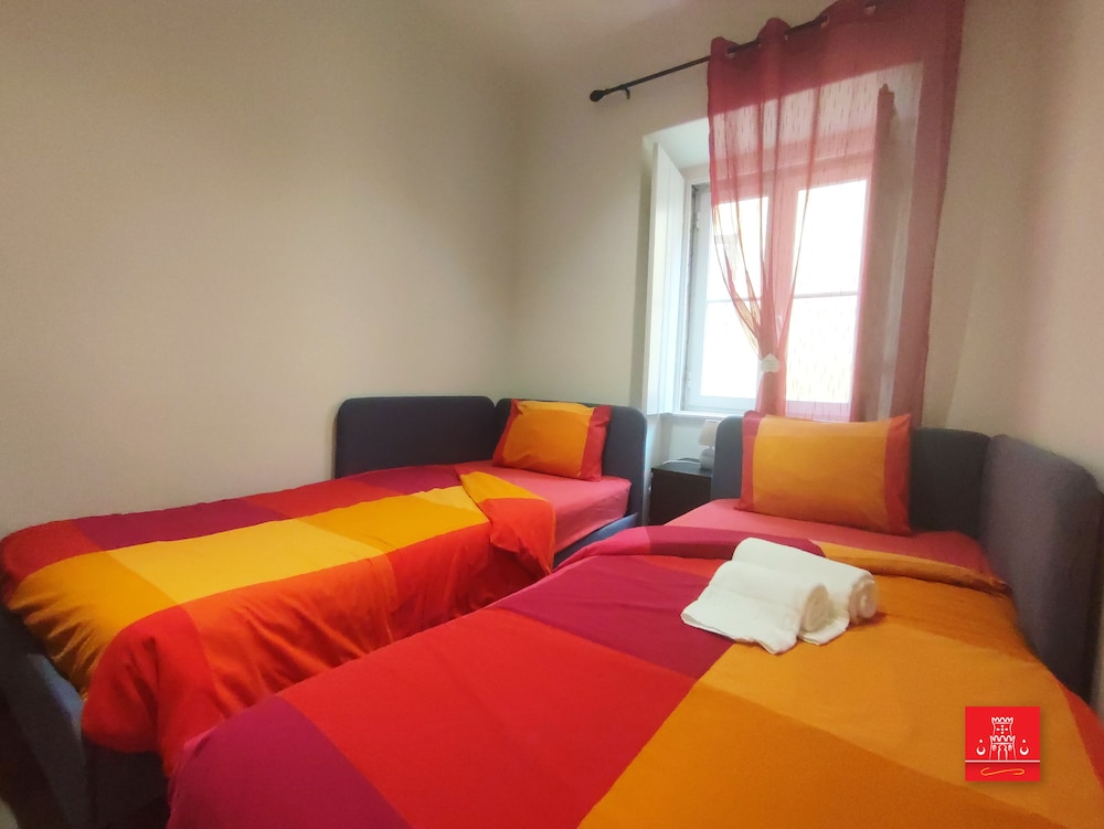 Habitación en Ciudad, 2 Camas Individuales con Baño Compartido