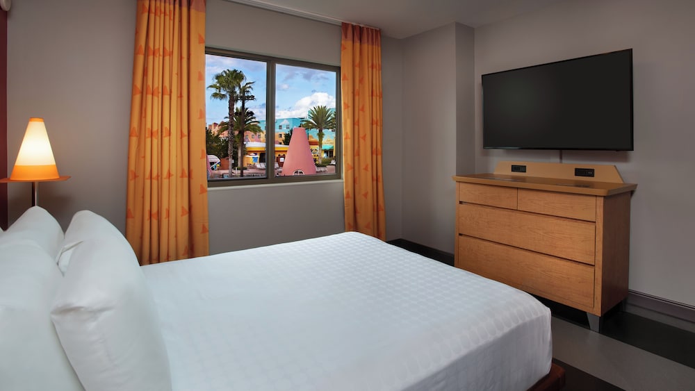 Cars Family Suites. Wheelchair accessible with tub and option for hearing accessibility.  1 queen be - Photo 1