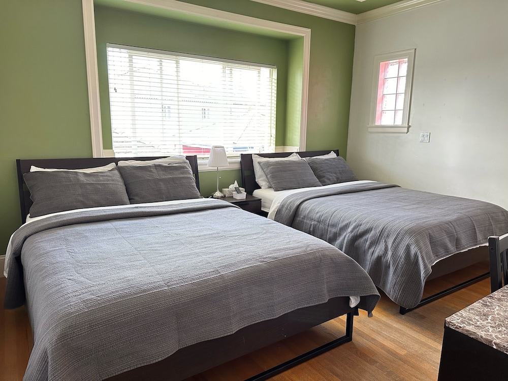 Deluxe Quadruple Room, 2 Queen Beds, Private Bathroom (Room G) photo 1