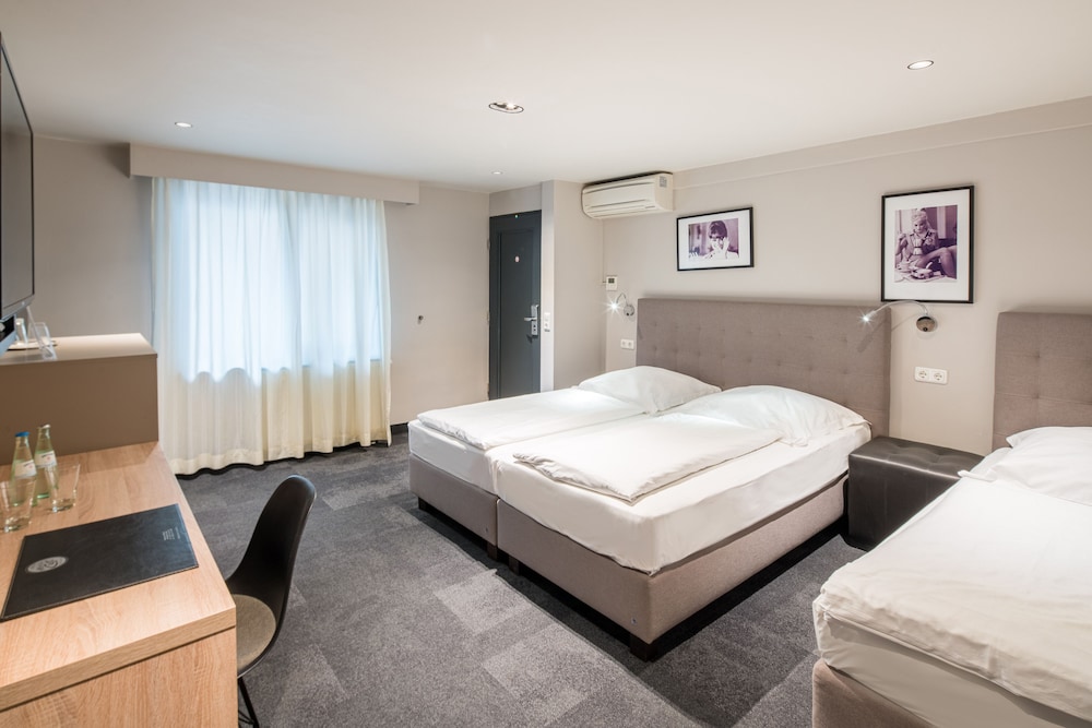 Standard Triple Room - Photo 1