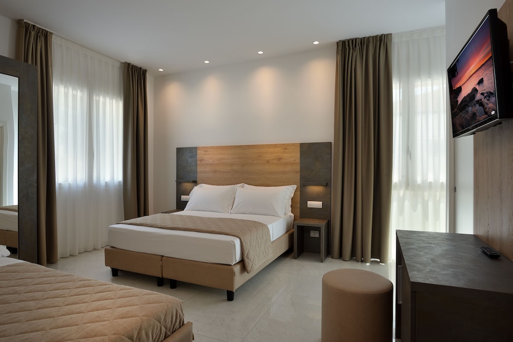 Quadruple Room - Photo 1