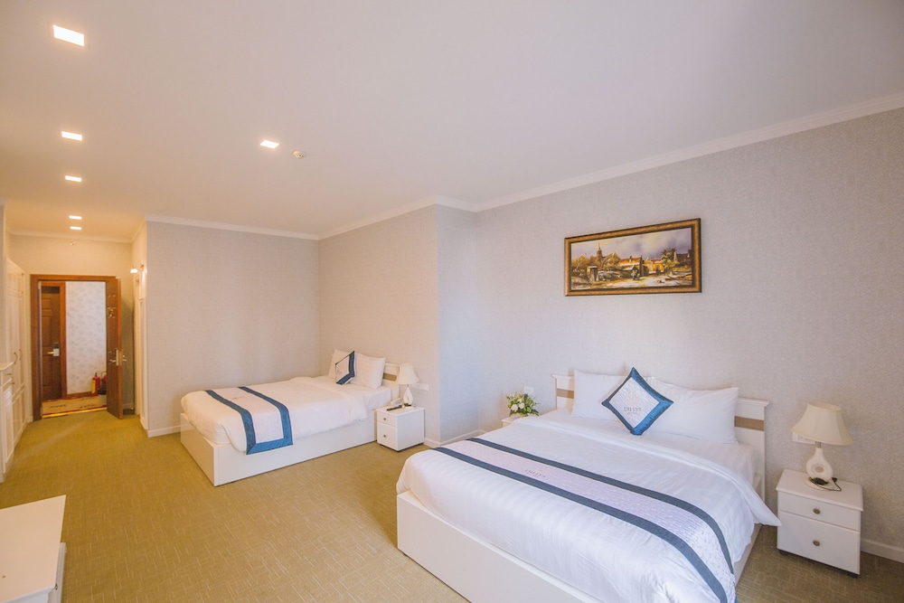 Deluxe Quadruple Room, 2 Queen Beds