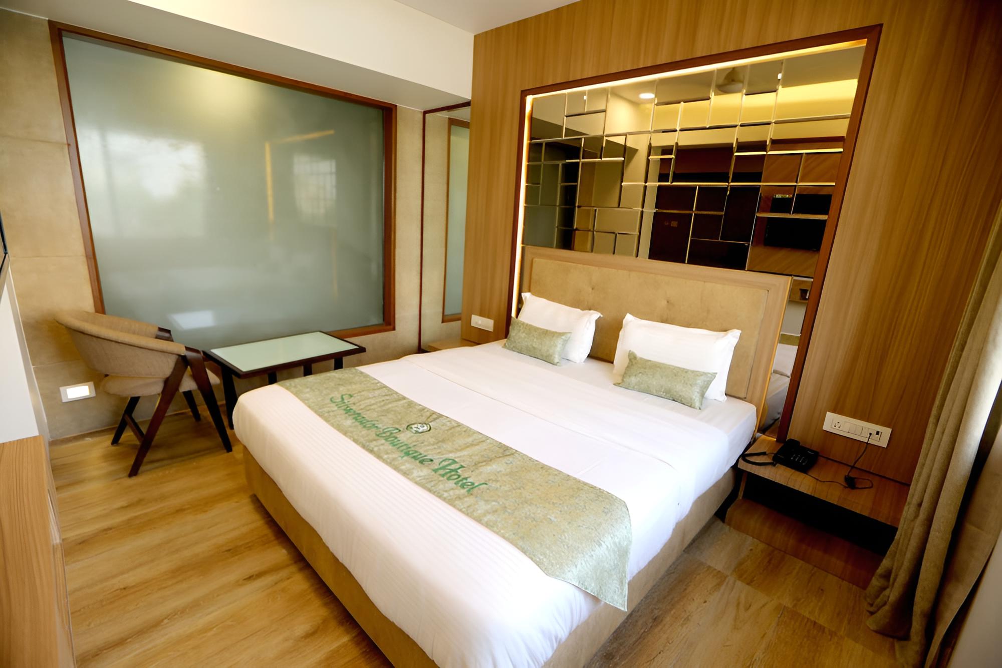 Deluxe Room - Photo 5