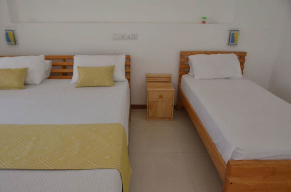Standard Quadruple Room, City View photo 3