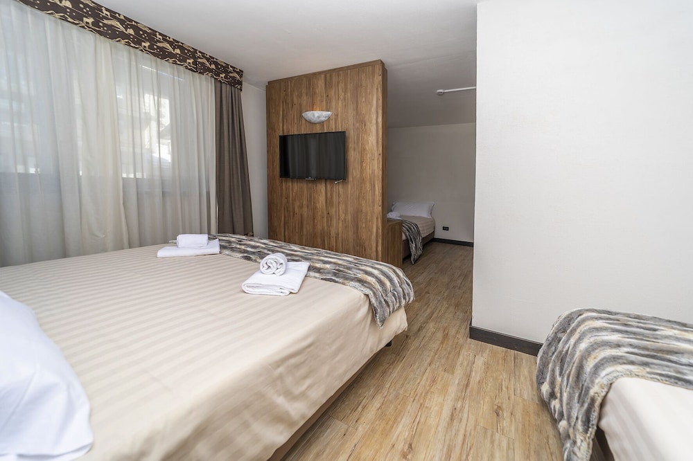 Family Quadruple Room - Photo 3