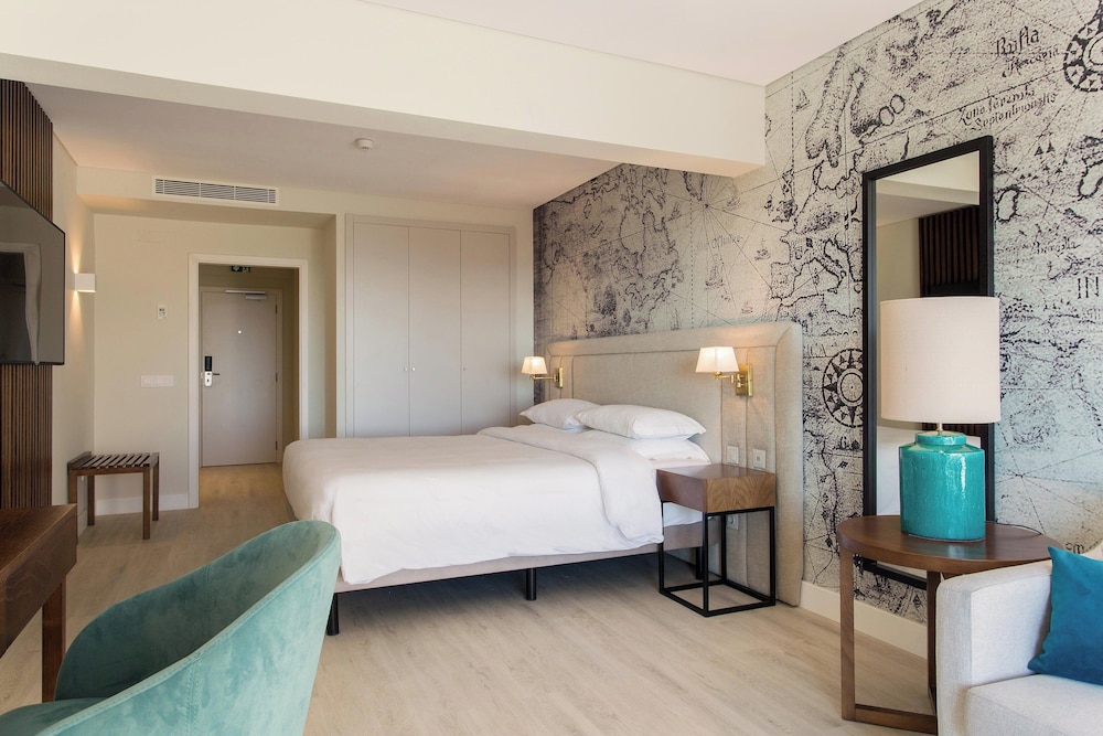 Deluxe Room, 1 Queen Bed with Sofa bed, Pool View - Photo 1