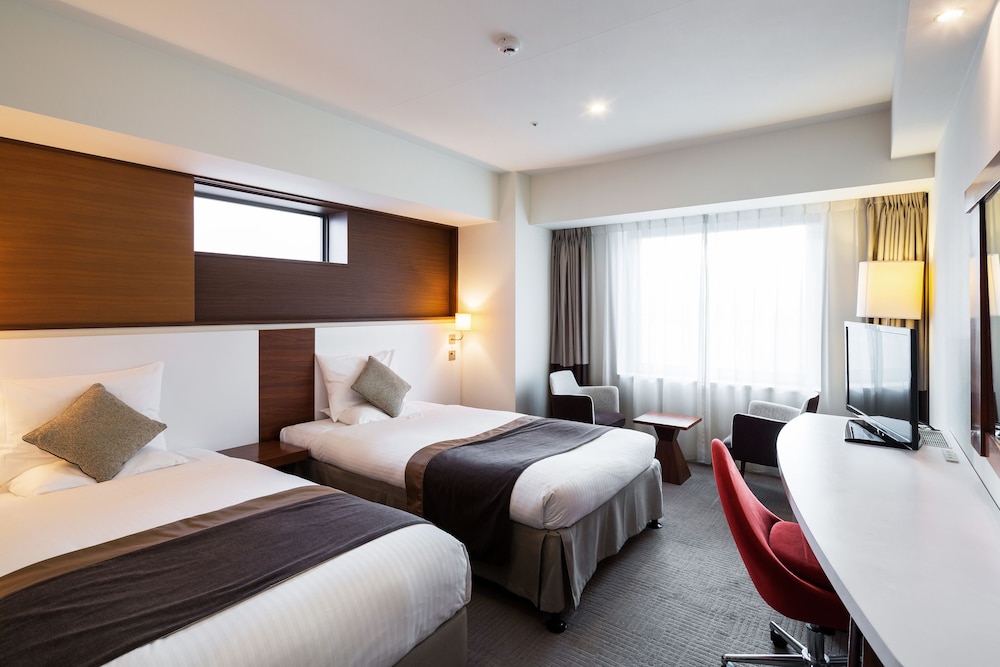 Deluxe Twin Room, Non Smoking (Eco Plan - No Cleaning Service) - Photo 1