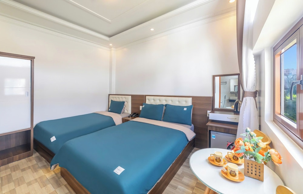 Deluxe Triple Room, City View