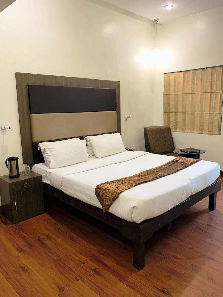 Deluxe Room - Photo 1
