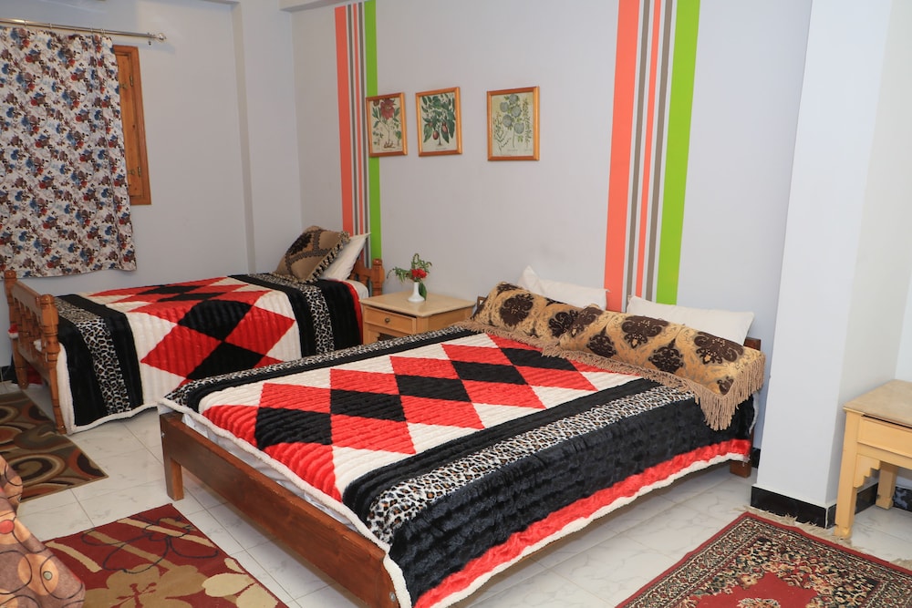 Room (Deluxe Family Room, Garden View) photo 1