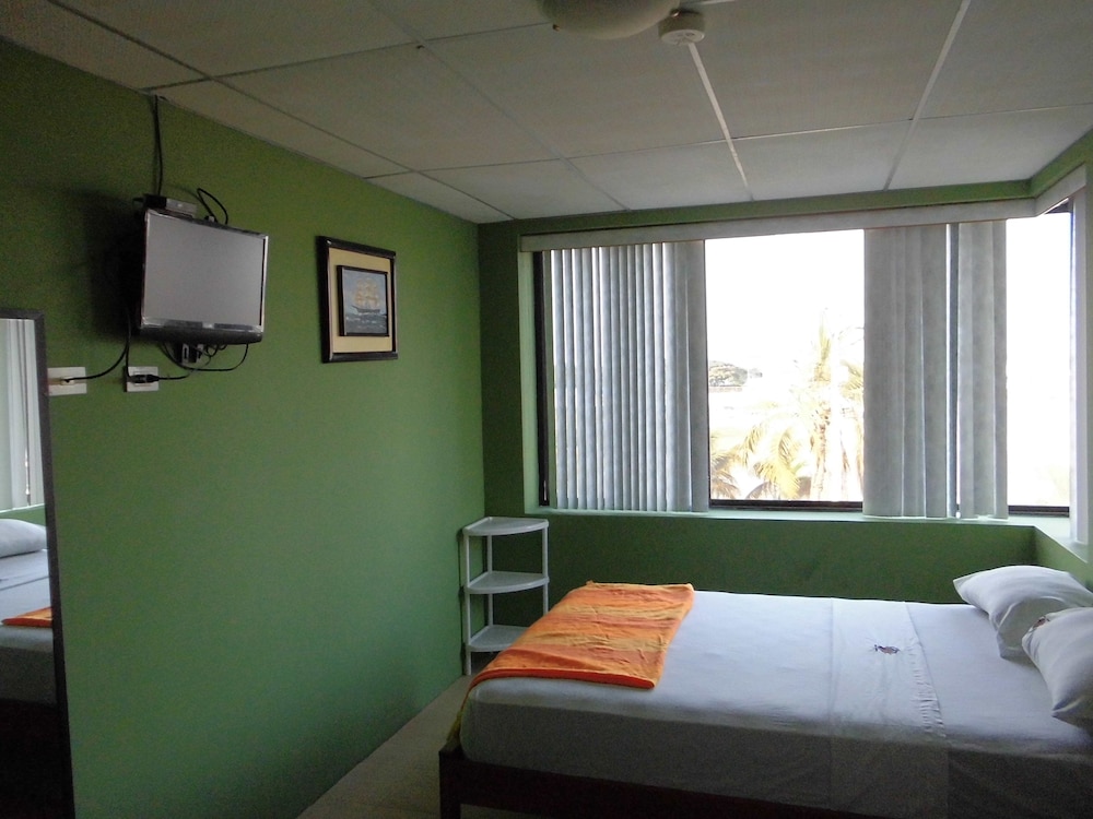 Standard Quadruple Room, 2 Double Beds, Ocean View photo 1