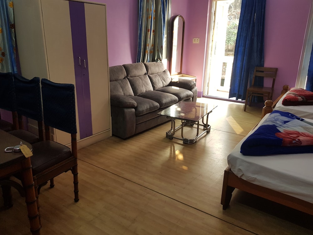 Deluxe Quadruple Room, Balcony, City View