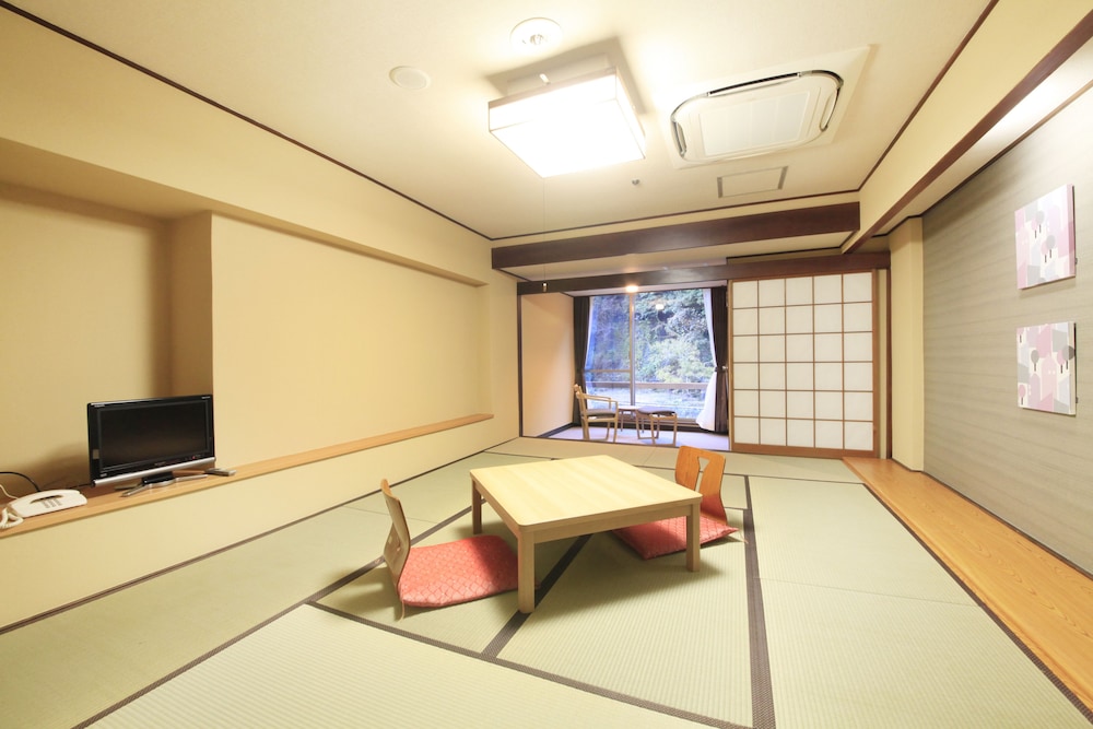 Japanese Style Room With Partially Open-Aired Bath