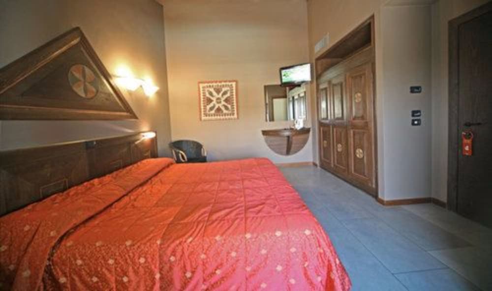 Deluxe Room - Photo 1
