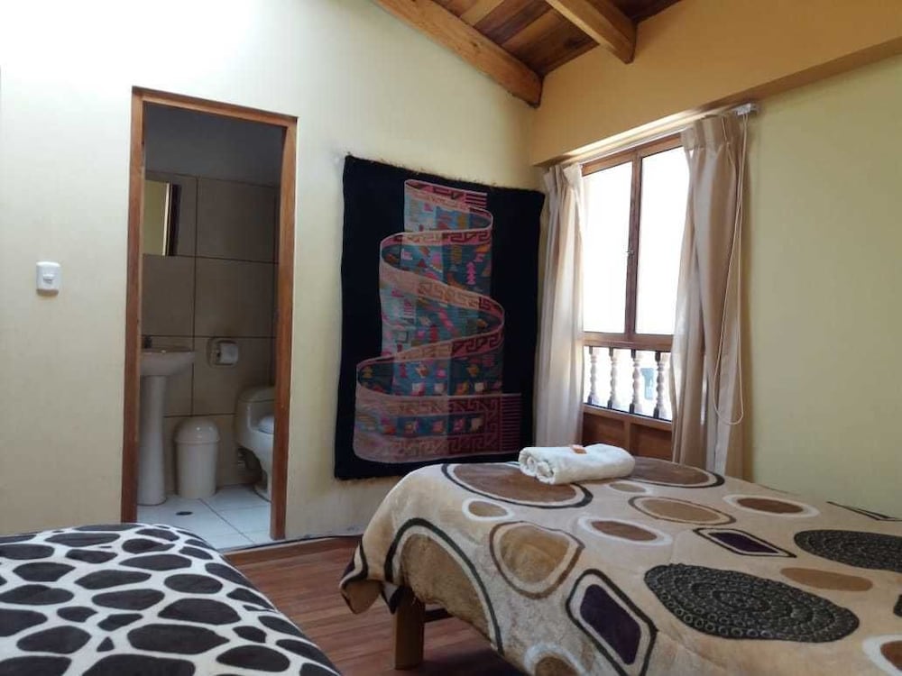 Standard Triple Room (1 Double and 1 Twin Bed) photo 3