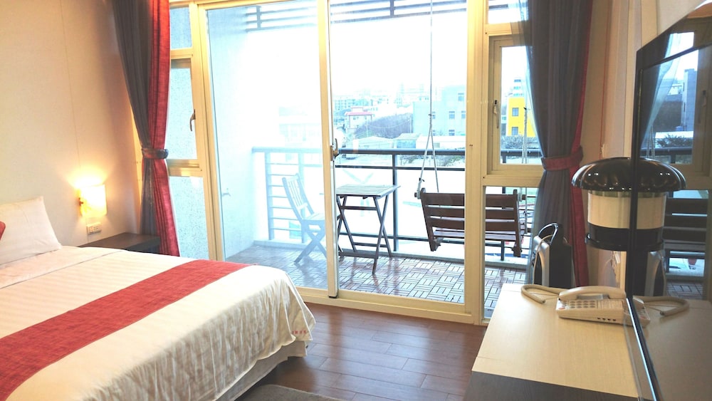 Signature Quadruple Room, 2 Double Beds, Non Smoking, Garden View photo 3