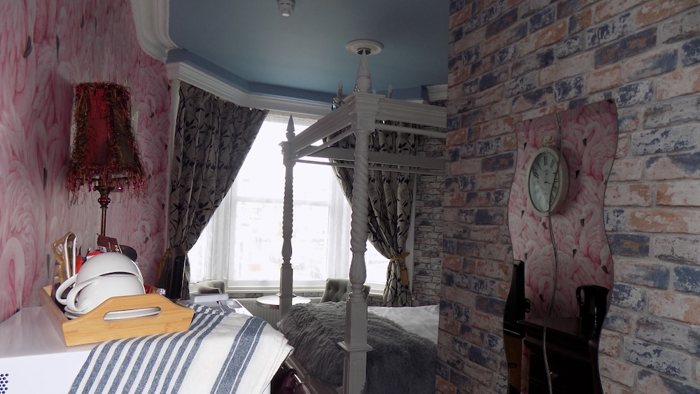 Double Room, Sea View (Flamingo Four Poster)