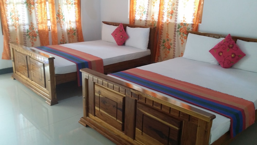 Deluxe Quadruple Room, 2 Queen Beds, Smoking, Garden View photo 1