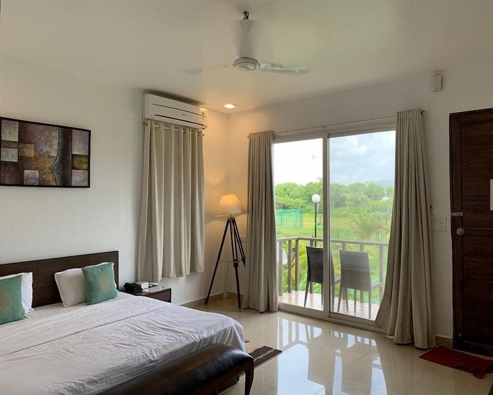 Deluxe Room - Photo 1