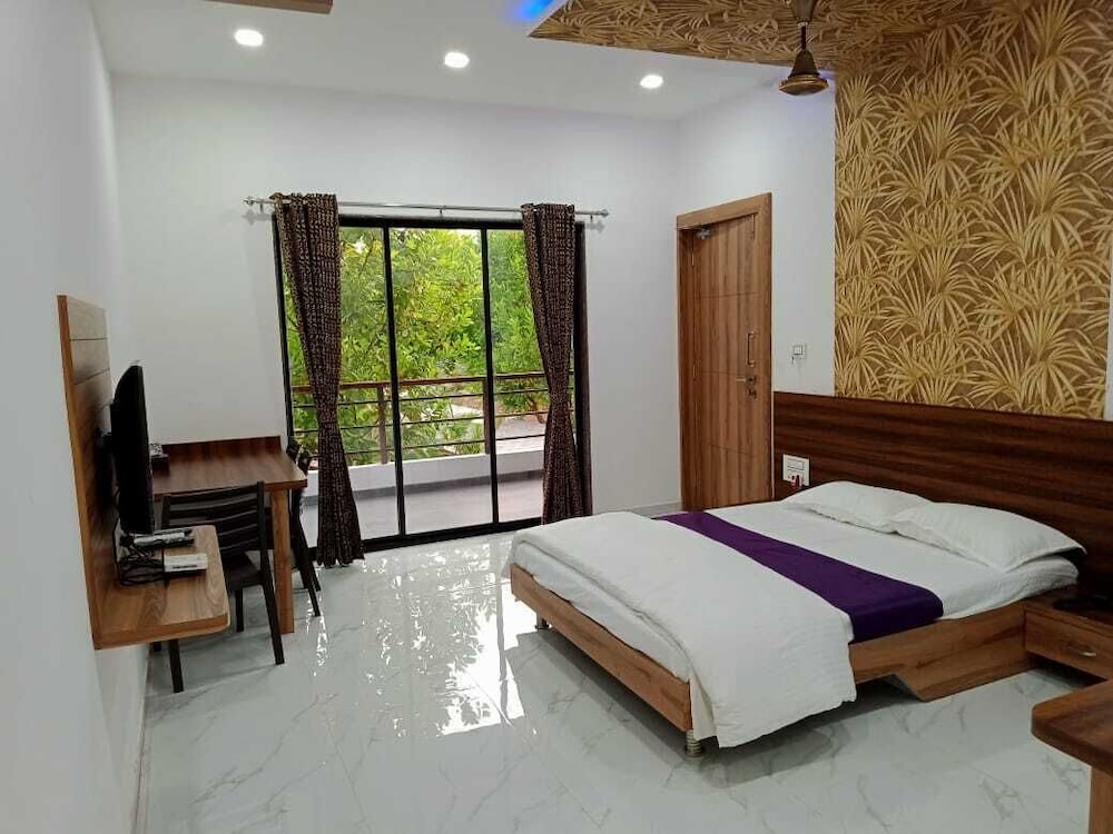 Deluxe Room - Photo 1